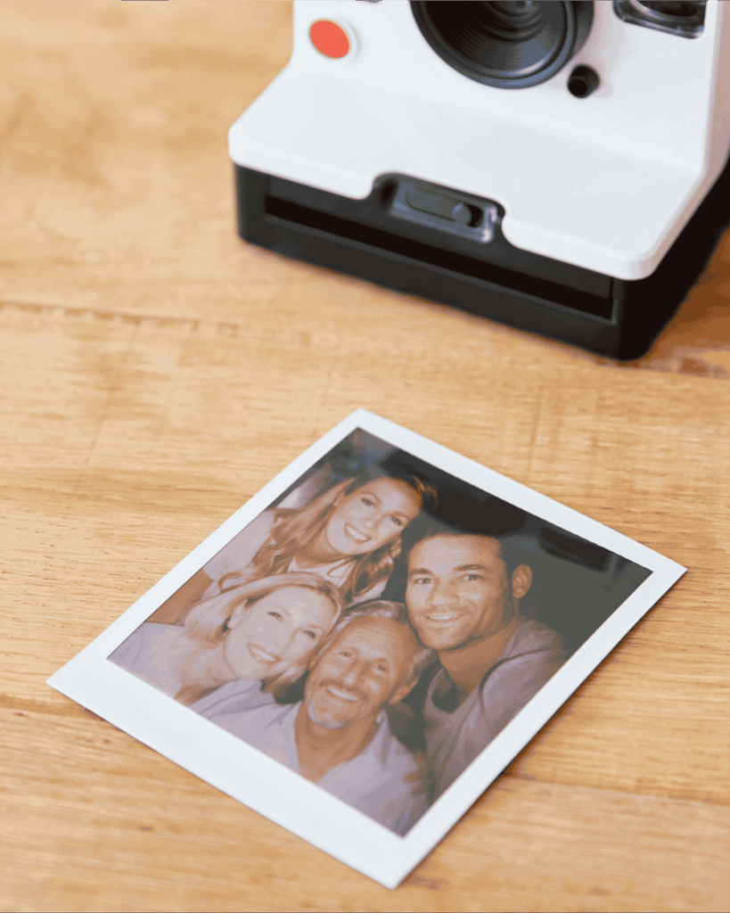 vintage-instant-film-camera-with-print-of-senior-p-2026-03-10-04-49-53-utc (1) 1 (1)